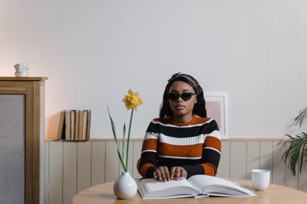 Girl Touching A Book